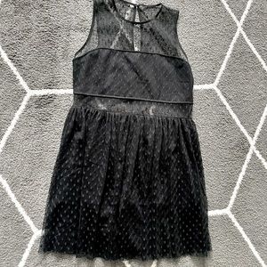 Black dress with see through cut outs and black shorts underneath